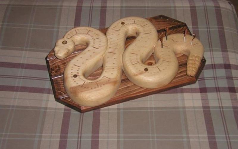 Cribbage board in the shape of a snake