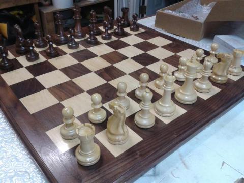 Top of chessboard with chessmen in place