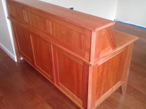 Back of African mahogany office reception desk