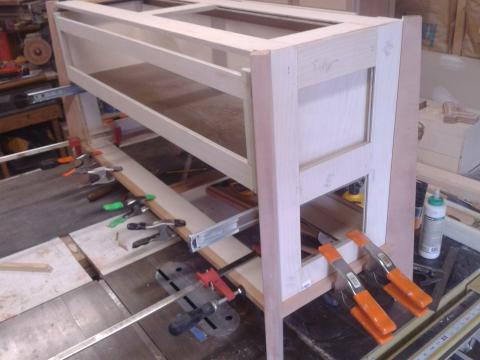 Lots of clamps needed to build this cabinet