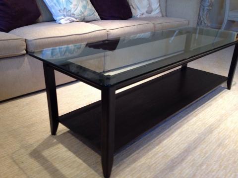 Ebony stained mahogany coffee table with tempered glass top