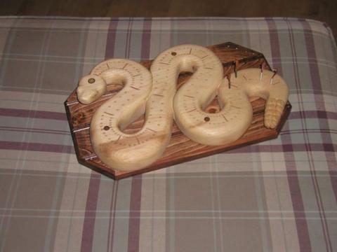 Cribbage board in the shape of a snake
