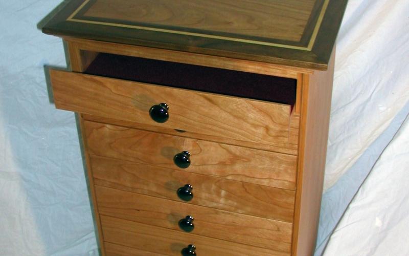 Music cabinet with cherry, black walnut and maple