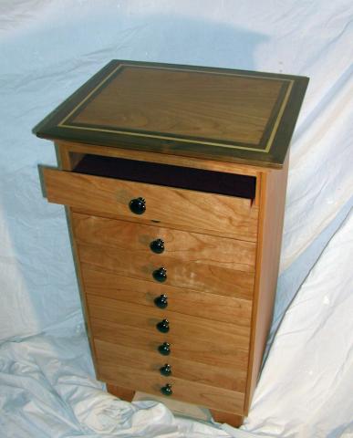 Music cabinet with cherry, black walnut and maple