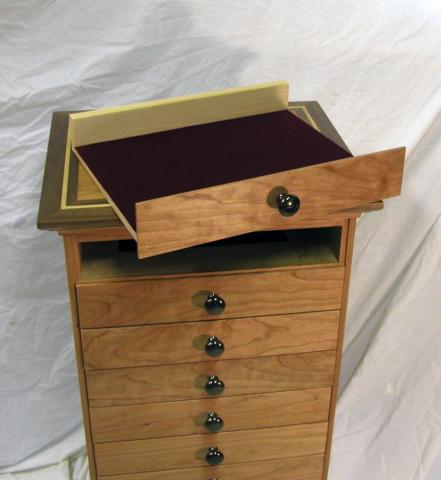 Music cabinet inside of a drawer